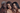 Three young women looking at camera while standing against a brown background